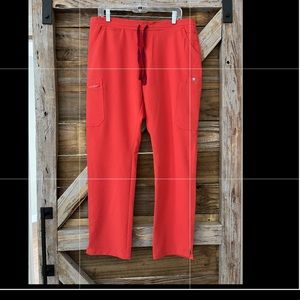 FIGS YOLA skinny scrub pants sz L. Color clay.